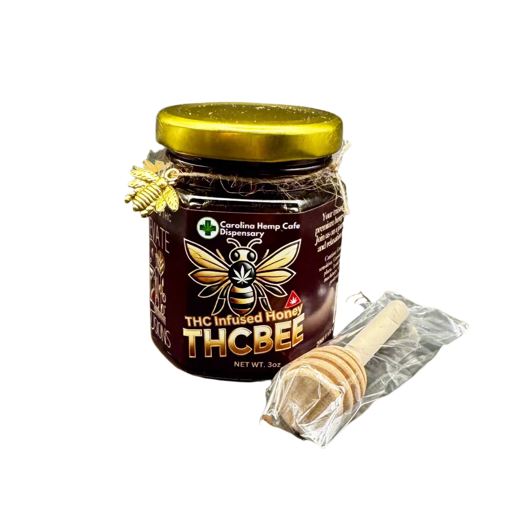 THC infused honey with golden lid and amber label called THCBEE with honey comb wooden drip stick included
