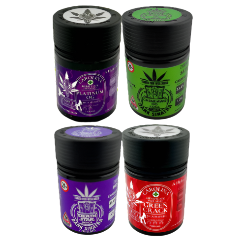 Five small containers with colorful labels on a white background