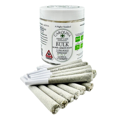 Jar of pre-rolled joints with individual joints on a white background