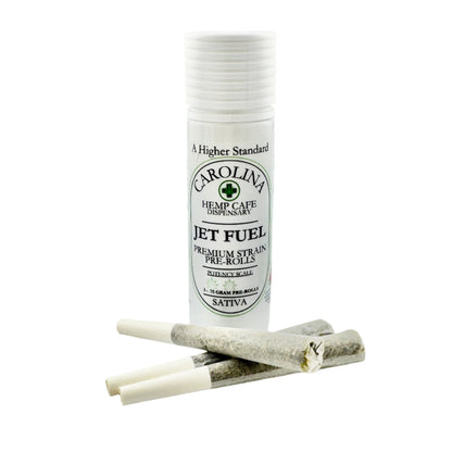 Carolina Hemp Cafe Dispensary pre-rolled joints with a packaging tube on a white background
