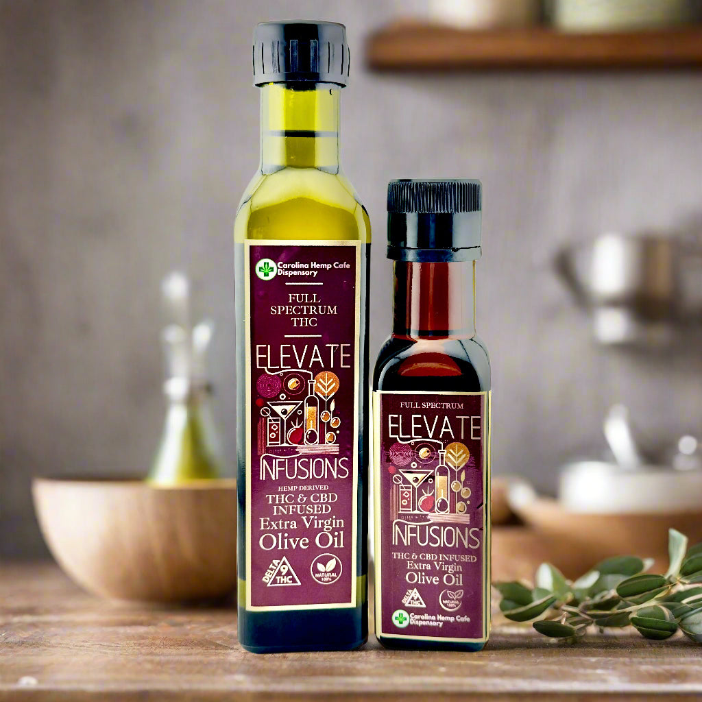 Two bottles of 'Elevate Infusions' olive oil on a white background