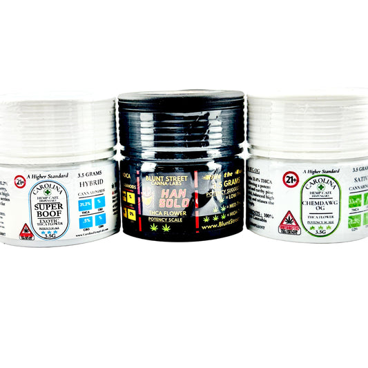 Three containers of cannabis products with visible branding on a white background