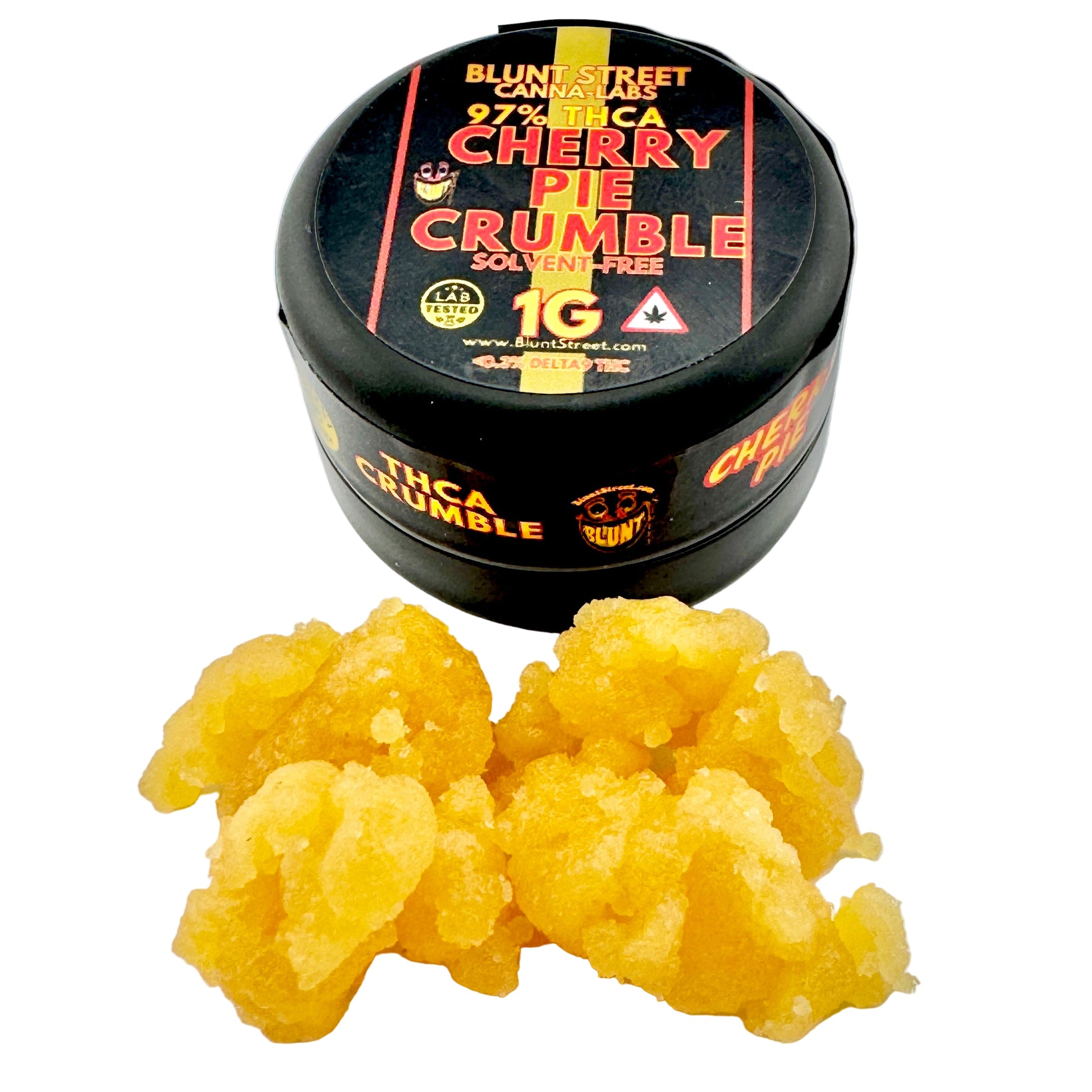 Jar of cherry pie crumble with yellow substance on a gray background