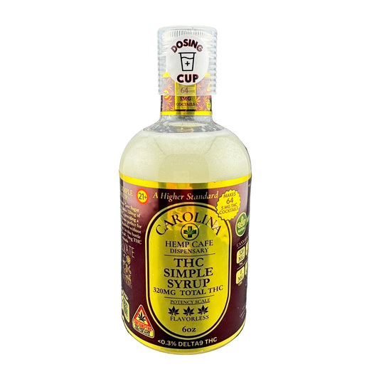 Bottle of Carolina Hemp Cafe THC Simple Syrup on a gray background
