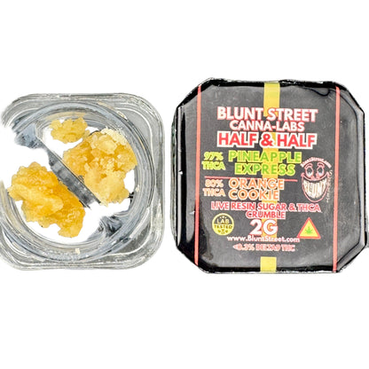Container of yellow resin with Blunt Street Canna-Labs packaging on a gray background