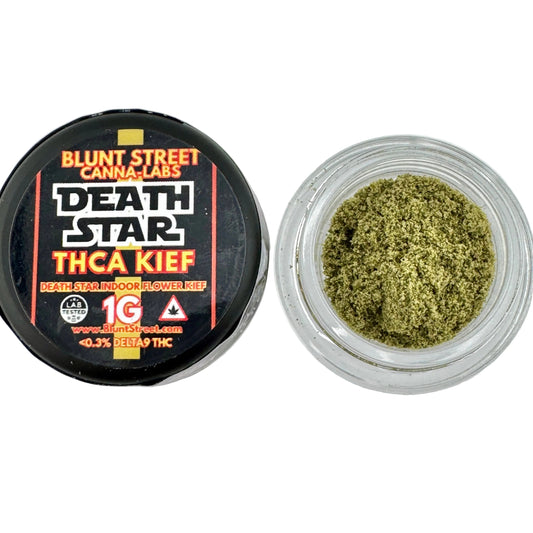 Jar of green cannabis powder with 'Blunt Street Canna Labs' label on a white background