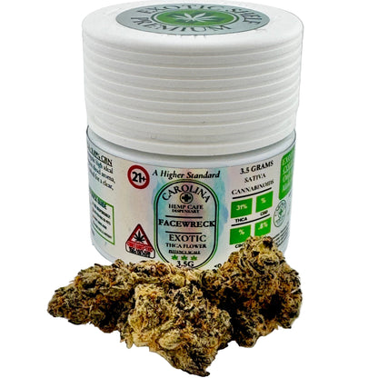 Jar of Carolina Hemp CBD Flower with cannabis buds on a white background