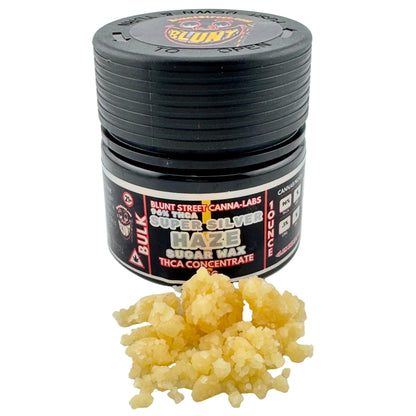 Black container of Blunt Street Canna-Labs product with yellow concentrate on a white background