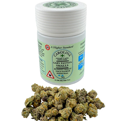 Jar of cannabis buds with a label on a white background