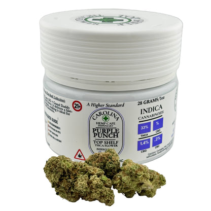 Jar of Carolina High Cafe Purple Punch cannabis with visible buds on a white background