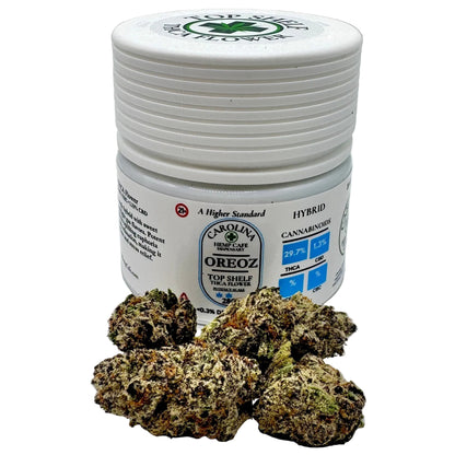Jar of OREOZ cannabis with cannabis buds on a white background