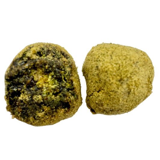 Two greenish-brown objects on a white surface with visible texture.