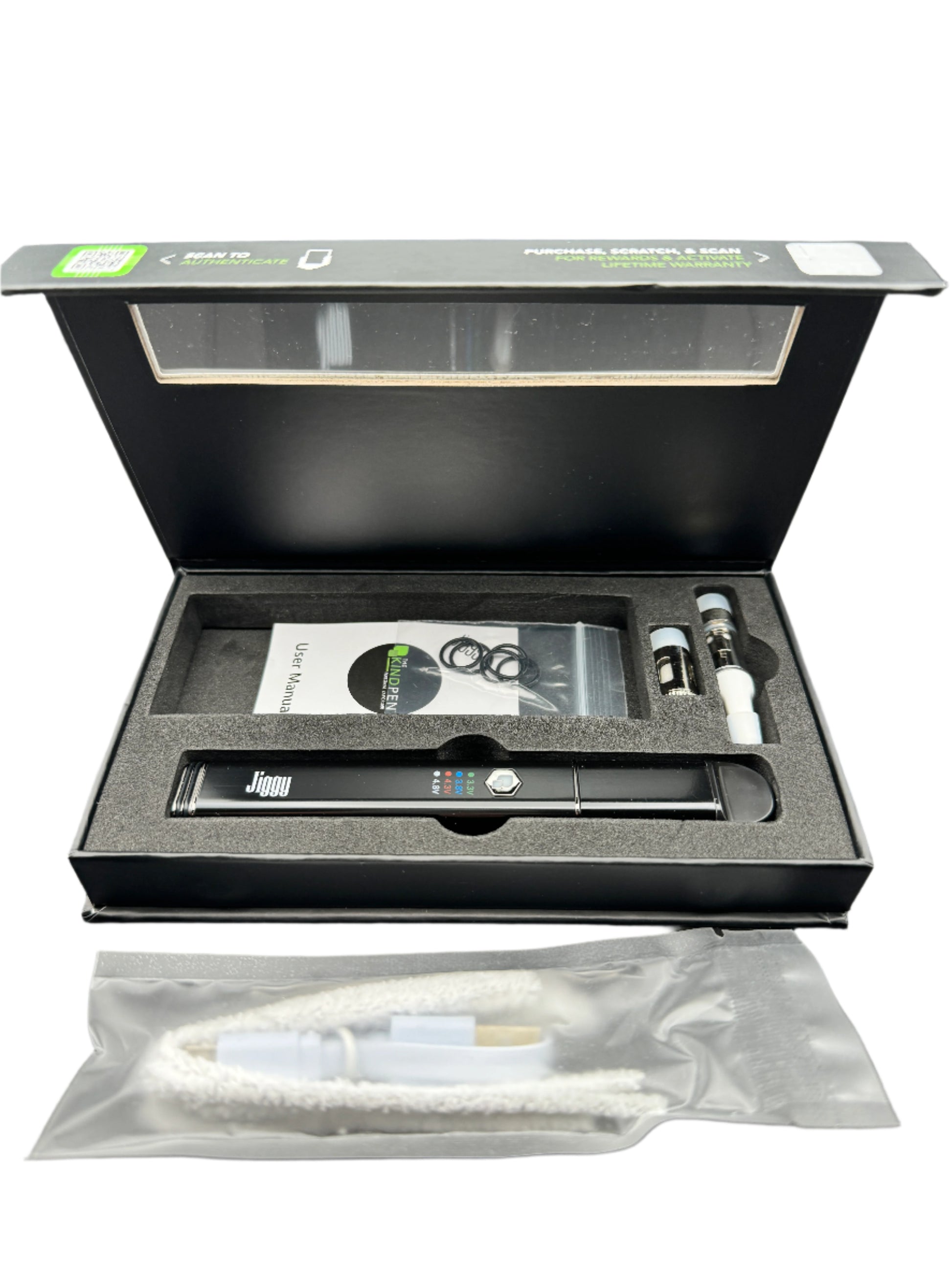 Open black box containing a vape device and accessories on a gray background