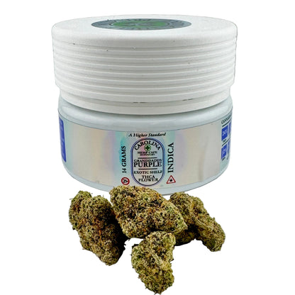 Jar of cannabis buds with a label on a gray background
