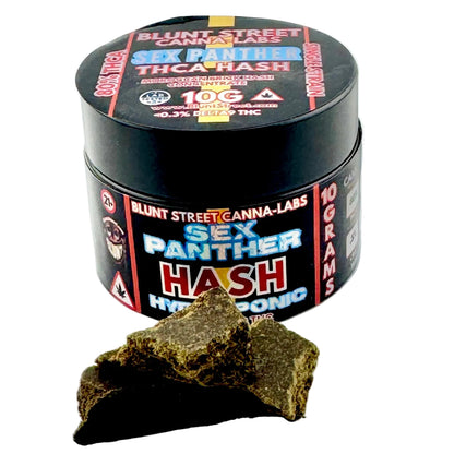 Jar of Sex Panther Hash from Blunt Street Canna Labs with cannabis buds on a white background