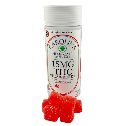 Carolina Hemp Cafe Dispensary container with strawberry-flavored THC gummies on a gray background