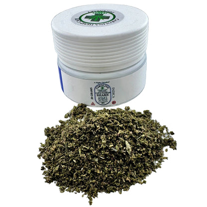 White container with cannabis product on a light gray background