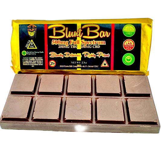 Blunt Bar chocolate bar with packaging on a light blue background