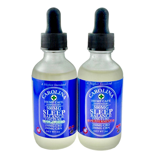 Two bottles of Carolina Hemp Cafe Sleep Balance tincture on a gray background