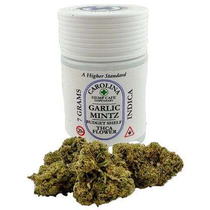 Jar of Carolina Hemp Cafe Garlic Mintz IndicaTHCA flower on a white background
