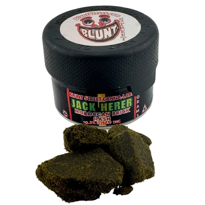 Black container with 'Blunt' branding and cannabis buds on a white background