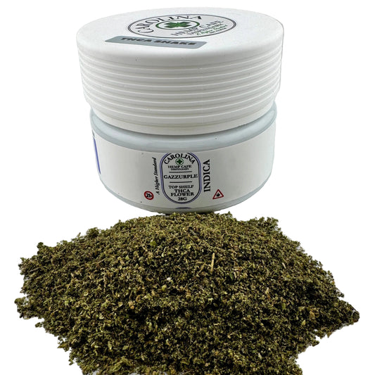 Jar of cannabis flower with a white lid on a light gray background