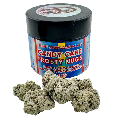 Jar of 'Candy Cane Frosty Nugs' from Blunt Street Canna-Labs with cannabis buds on a white background