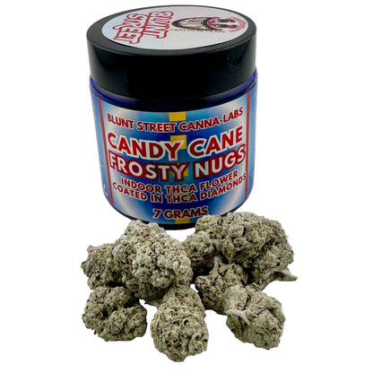 Jar of 'Candy Cane Frosty Nugs' from Blunt Street Canna Labs with cannabis buds on a white background