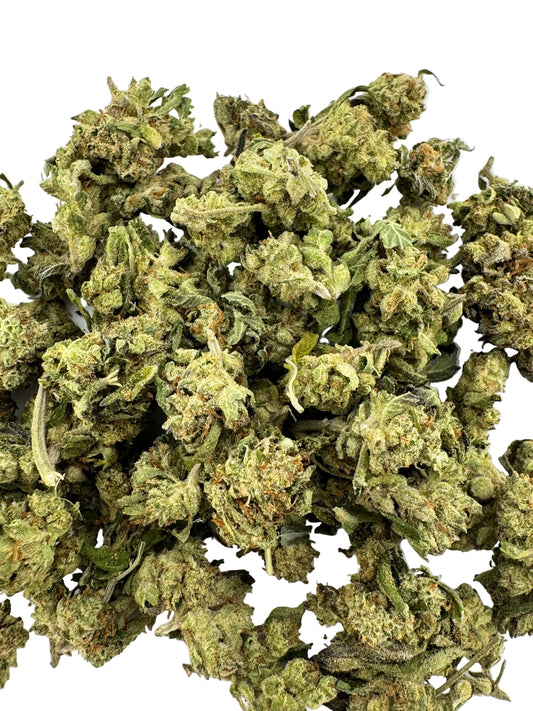 Close-up of dried cannabis buds on a white background