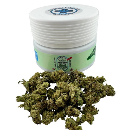 Jar of cannabis buds with a visible brand label on a white background