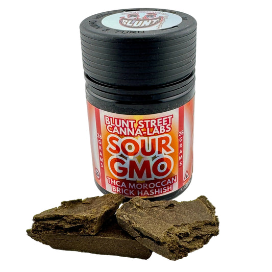 Jar of Blunt Street Canna-Labs Sour GMO hashish with two pieces of hash on a white background
