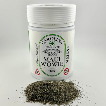 Jar of Carolina Hemp Cafe dispensary THCA flower shake labeled 'Maui Wowie' on a white background.