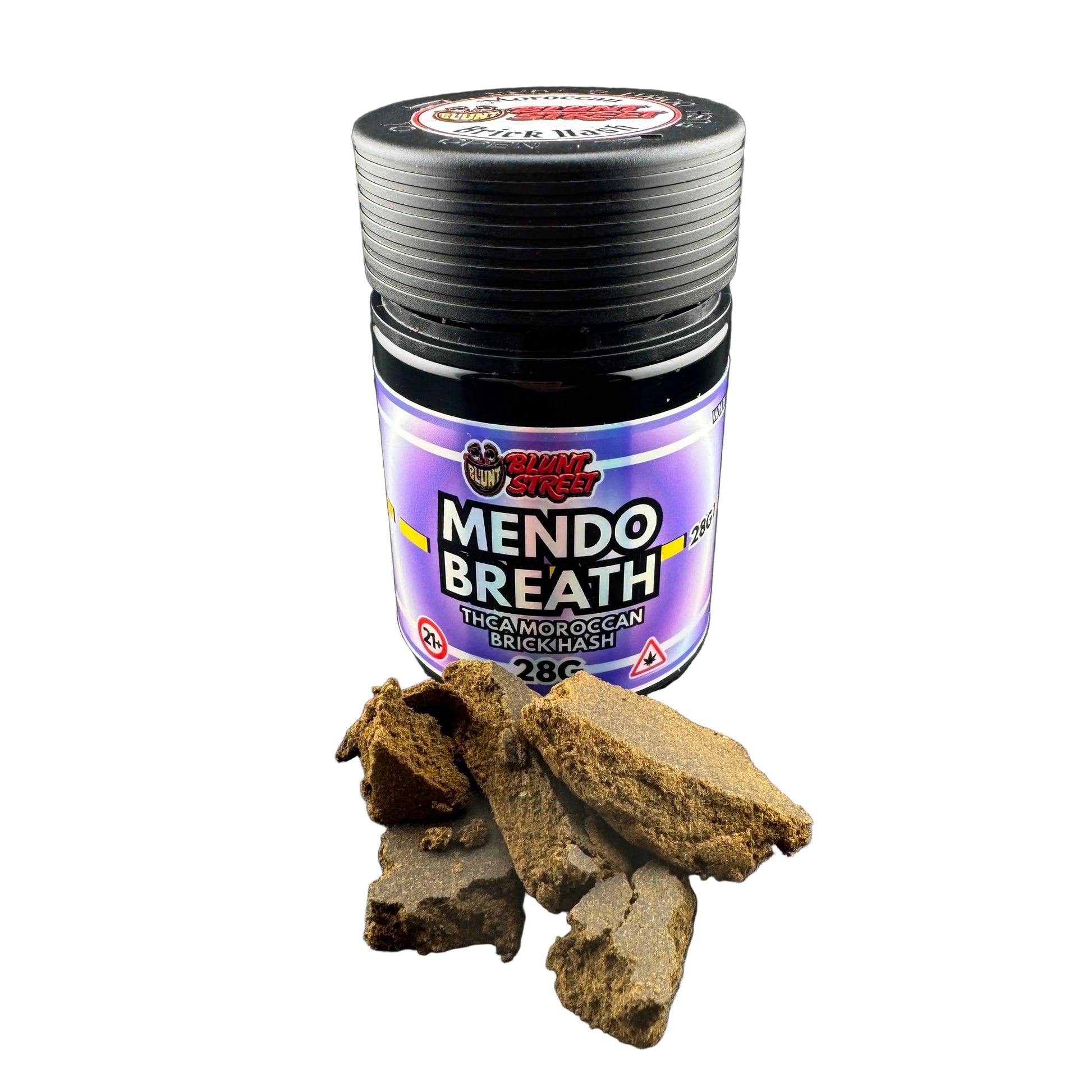 A jar of Sticky Bites Mendo Breath thick Moroccan brichash bait, shown with several pieces of the brown bait scattered in front on a dark gray surface.