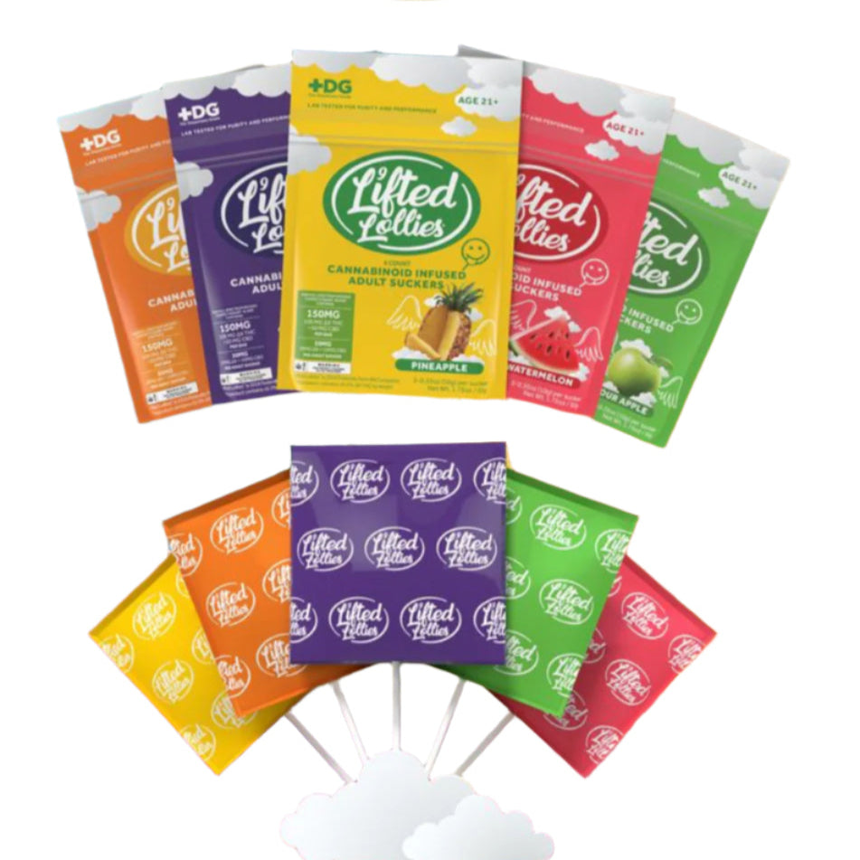 An assortment of Lifted Lollies THC lollipops with various colorful packaging displayed against a vibrant, cloud-filled sky background. Each lollipop has a different flavor label.