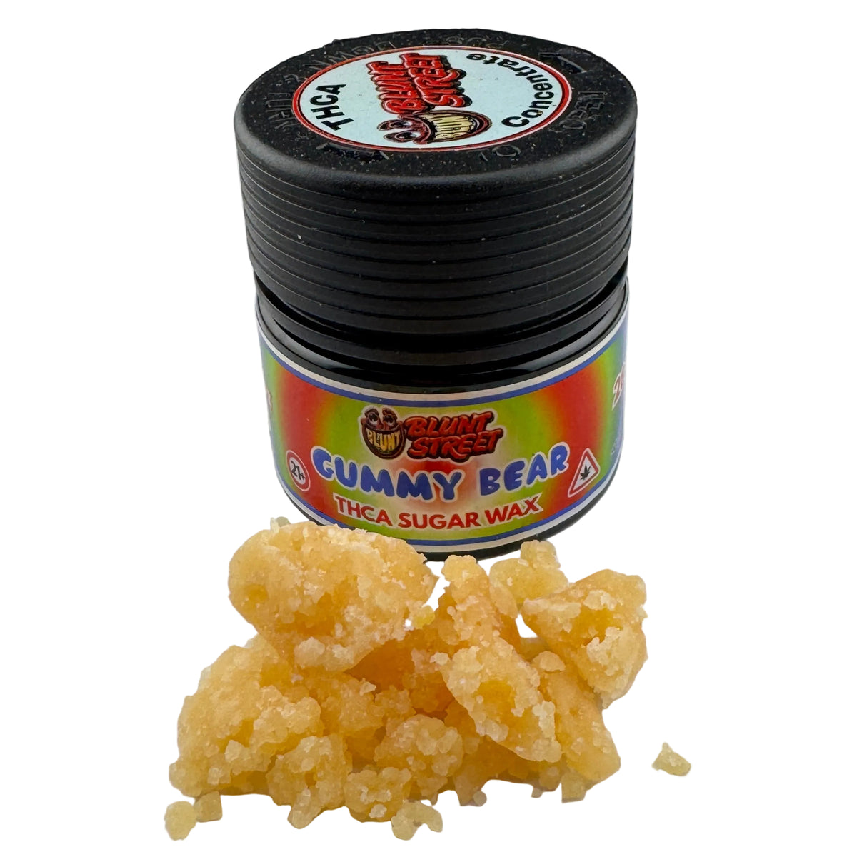 A jar of Gummy Bear Shea Sugar Wax by Evil Acres, featuring a black lid and a colorful label, with a small pile of the translucent yellow wax beads placed in front on a white surface.