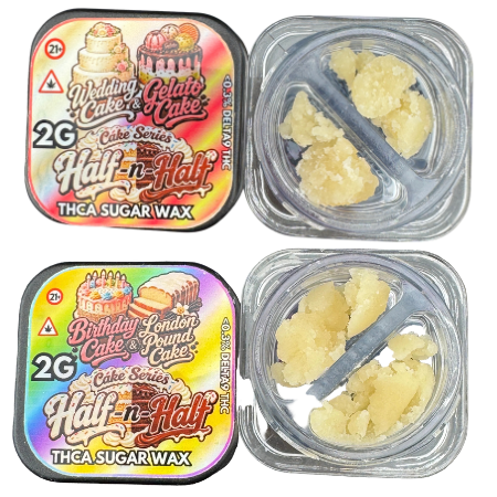 Two square plastic containers of THCA sugar wax shown on a white background, each with a colorful printed lid and a clear compartment containing pale yellow wax crystals. The lids feature cake-themed graphics and text including 'Wedding Cake & Gelato Cake', 'Half-N-Half', '2G', and 'THCA SUGAR WAX'.