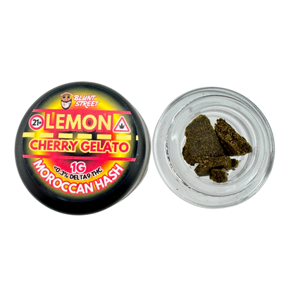 Jar of Moroccan hash labeled 'Lemon Cherry Gelato' with a visible warning label on a white background.