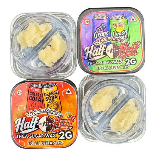 Four square plastic containers of Half-n-Half brand THCA sugar wax in different soda flavors, arranged in a 2x2 grid on a white background. The top-left container is Cherry Cola, the top-right is Grape and Lemon, the bottom-left is Cherry Cola, and the bottom-right is Orange.